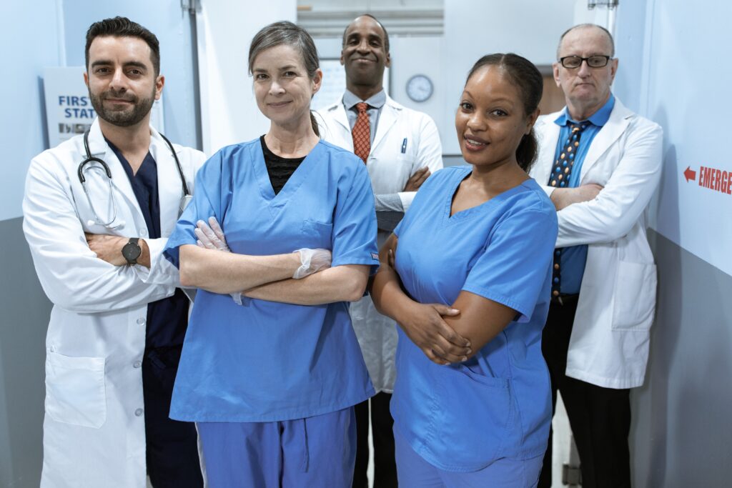 2-male-2-female-doctors-standing-with-arms-folded